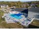 Relaxing community pool and spa with surrounding patio furniture at 1400 Gandy N Blvd # 506, St Petersburg, FL 33702