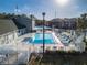 Community pool and surrounding deck; a relaxing resort-style setting at 1400 Gandy N Blvd # 506, St Petersburg, FL 33702