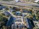 Aerial view showing apartment buildings, pool, and surrounding area at 1400 Gandy N Blvd # 506, St Petersburg, FL 33702