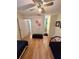 Bedroom with two twin beds and ceiling fan at 1400 Gandy N Blvd # 506, St Petersburg, FL 33702