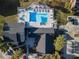 Complex aerial view, showing pool, clubhouse, and surrounding buildings at 1400 Gandy N Blvd # 506, St Petersburg, FL 33702