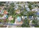 Wide aerial view of neighborhood with houses and pools at 1534 Wexford N Dr, Palm Harbor, FL 34683