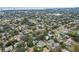 High-level aerial view of houses and streets at 1534 Wexford N Dr, Palm Harbor, FL 34683