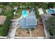 Aerial view showcases the home's layout and surrounding neighborhood at 1534 Wexford N Dr, Palm Harbor, FL 34683