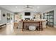 Spacious living room with vaulted ceilings, fireplace, and pool view at 1534 Wexford N Dr, Palm Harbor, FL 34683