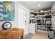 Well-organized pantry with ample shelving for storage at 1534 Wexford N Dr, Palm Harbor, FL 34683