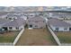 Aerial view of the house and backyard, showing a large fenced area at 16779 Sunburst Lake St, Wimauma, FL 33598