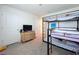 Bedroom with bunk beds and plenty of space for children at 16779 Sunburst Lake St, Wimauma, FL 33598