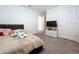 Bedroom with queen bed and dresser, near additional rooms at 16779 Sunburst Lake St, Wimauma, FL 33598