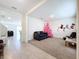 Foyer view with a pink Christmas tree, and access to living and dining areas at 16779 Sunburst Lake St, Wimauma, FL 33598