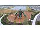 playground with play structure, slides, and climbing features at 16779 Sunburst Lake St, Wimauma, FL 33598