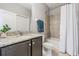 Bathroom with granite countertop and bathtub at 19724 Post Island Loop, Land O Lakes, FL 34638