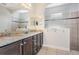 Elegant bathroom with granite countertops and a large shower at 19724 Post Island Loop, Land O Lakes, FL 34638