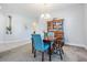 Dining area with wooden table and chairs, and a hutch at 19724 Post Island Loop, Land O Lakes, FL 34638