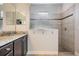 Large tiled shower with glass enclosure and built-in seat at 19724 Post Island Loop, Land O Lakes, FL 34638