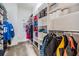 Spacious walk-in closet with ample shelving and hanging space at 19724 Post Island Loop, Land O Lakes, FL 34638