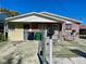 Brick duplex with fenced yard and off-street parking at 2105 W Gray St, Tampa, FL 33606