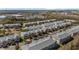 Wide shot of the townhome community from above at 26614 Castleview Way, Wesley Chapel, FL 33544