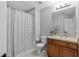 Bathroom with shower/tub, toilet and vanity at 26614 Castleview Way, Wesley Chapel, FL 33544
