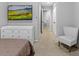 Bedroom with dresser and sitting chair at 26614 Castleview Way, Wesley Chapel, FL 33544