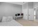 Bedroom with desk and twin-size bed at 26614 Castleview Way, Wesley Chapel, FL 33544
