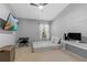 Bedroom with a queen bed and workspace at 26614 Castleview Way, Wesley Chapel, FL 33544