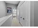 Upper hallway with access to bedrooms and closets at 26614 Castleview Way, Wesley Chapel, FL 33544