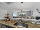 Kitchen with granite countertops and view of living room at 26614 Castleview Way, Wesley Chapel, FL 33544