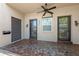 Condo entry with tile flooring, double doors, and ceiling fan at 301 Cordova Grn, Seminole, FL 33777