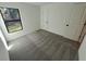 Bright bedroom with grey carpet and window at 3378 Escobar Ln, North Port, FL 34286