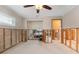 A bedroom under renovation, showing exposed framing and flooring at 3910 Americana Dr, Tampa, FL 33634