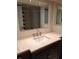 Bathroom with dark vanity, updated countertop, and a sink at 400 Island Way # 1508, Clearwater Beach, FL 33767