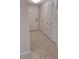 Bright condo entryway with white doors and tile flooring at 400 Island Way # 1508, Clearwater Beach, FL 33767