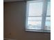 Window with blinds, showcasing a scenic water view at 400 Island Way # 1508, Clearwater Beach, FL 33767