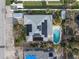 Overhead view of house with pool and solar panels at 404 87Th Ave, St Pete Beach, FL 33706