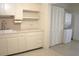 Efficient kitchen with white cabinets and built in appliances at 4154 57Th N St # 173, Kenneth City, FL 33709