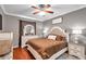 Large main bedroom with a king-size bed and plenty of dresser space at 4506 Mapletree Loop, Wesley Chapel, FL 33544