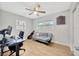 Home office featuring a desk, comfortable chair, and a sofa at 4519 S Hesperides St, Tampa, FL 33611