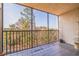 Private screened balcony with scenic wooded views at 5400 Park N St # 209, St Petersburg, FL 33709