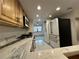 Updated kitchen with granite countertops and stainless steel appliances at 5400 Park N St # 209, St Petersburg, FL 33709