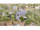 Aerial view showing home's backyard and surrounding trees at 5832 Red Cedar Ln, Tampa, FL 33625