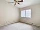 Bright bedroom with ceiling fan and window at 5832 Red Cedar Ln, Tampa, FL 33625