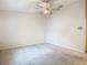 Spacious bedroom with ceiling fan and carpeted floor at 5832 Red Cedar Ln, Tampa, FL 33625