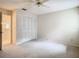 Bedroom with double-door closet and bathroom access at 5832 Red Cedar Ln, Tampa, FL 33625