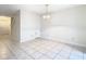 Spacious dining area with tile floors and adjacent entryway at 5832 Red Cedar Ln, Tampa, FL 33625
