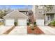 Three-unit townhome building with two-car garages at 5832 Red Cedar Ln, Tampa, FL 33625