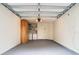Garage with washer, dryer, and extra storage space at 5832 Red Cedar Ln, Tampa, FL 33625