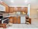 Modern kitchen with wood cabinets, stainless steel appliances at 5832 Red Cedar Ln, Tampa, FL 33625