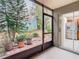 Screened porch with view of the backyard and kitchen access at 5832 Red Cedar Ln, Tampa, FL 33625