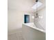Upstairs hallway with chandelier and skylight at 5832 Red Cedar Ln, Tampa, FL 33625